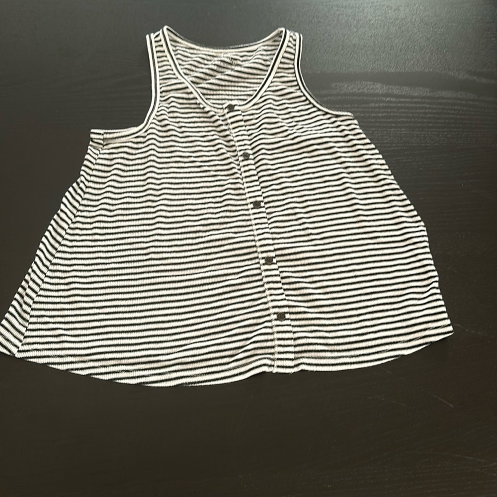 Girls striped black and white tank top with button size large (10-12).
